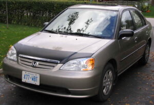 2003 Honda Civic with a magnetic car bra.
