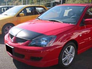 2005 Mitsubishi Lancer with a magnetic car bra