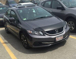 2014 Honda Civic with a magnetic car bra.