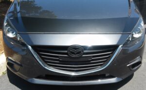 2014 Mazda 3 with a magnetic car bra