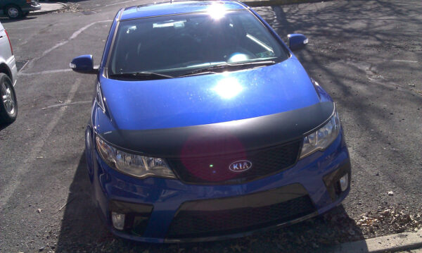 Kia Forte with a magnetic car bra